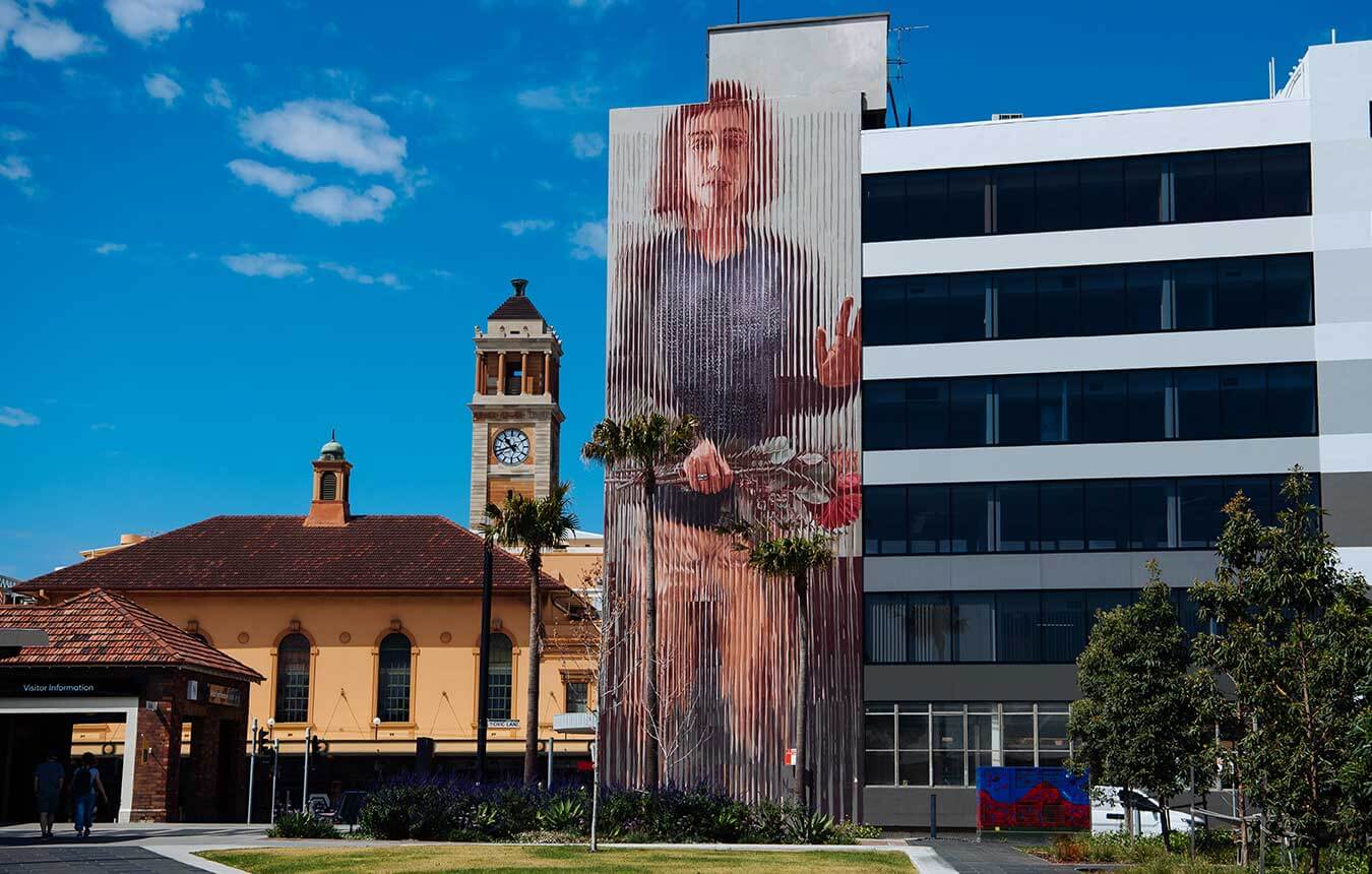 Fintan Magee dreamwall mural on Civic Lane opposite Museum Park in Newcastle