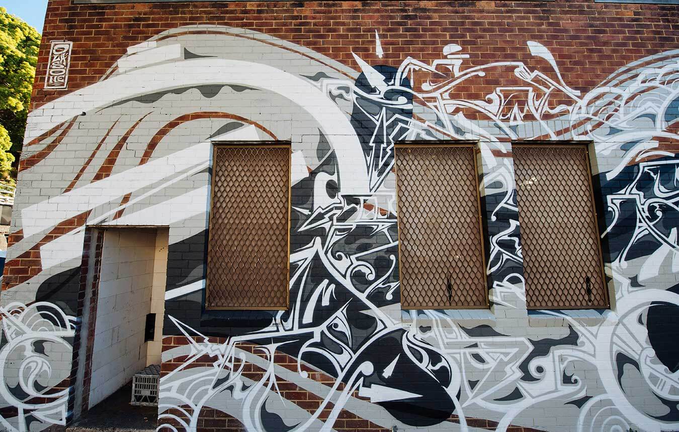 Olas One mural on FogHorn Brewery building in King Street, Newcastle