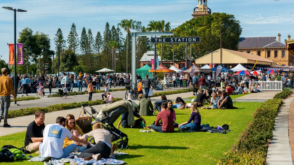 Picnickers at the revitalised former city railway station in Newcastle.